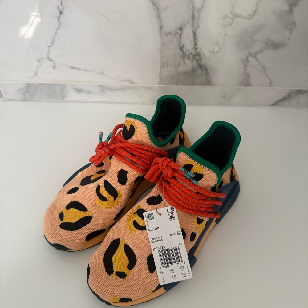 Pharrell Williams Adidas Sneakers with Leopard Print and Red Laces